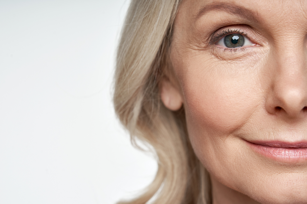 Close-up of a smiling woman's face.